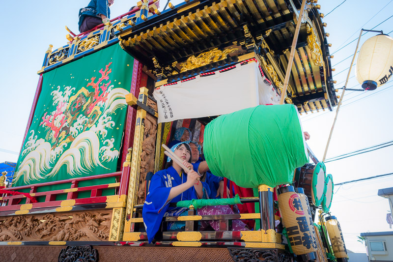 Breaking up the monotony, a festival float during the day.