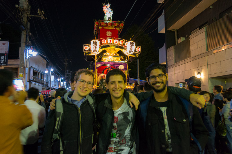 Me, Junio and Shaikh. Behind us, a festival float.